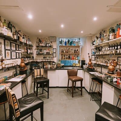 Distill a bottle of Gin on mini copper stills