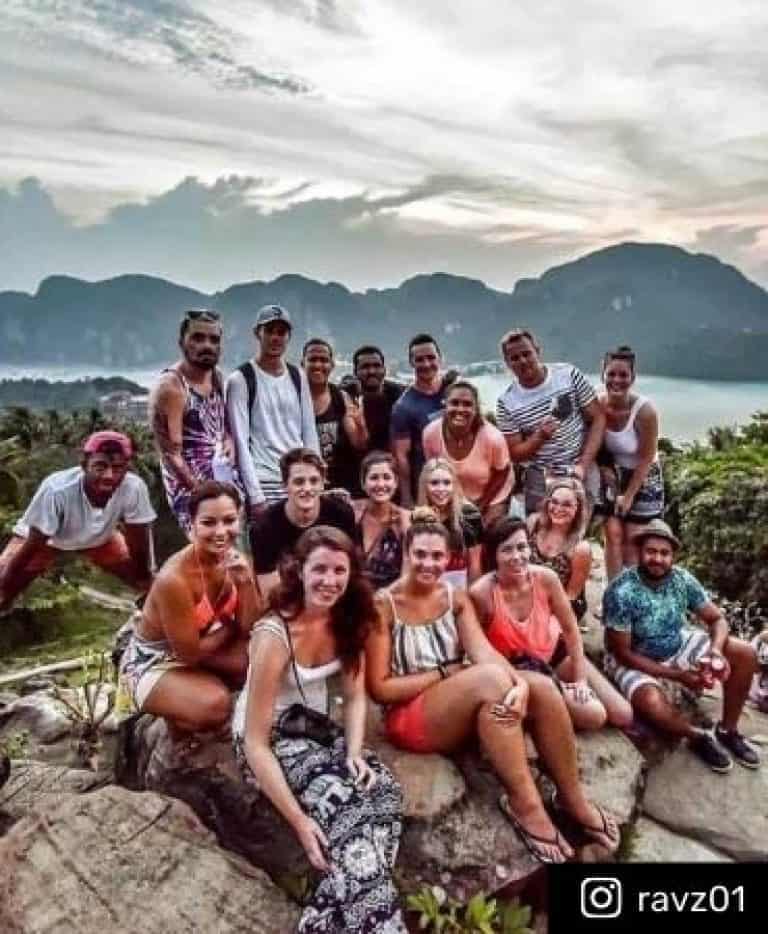 Group of travellers on Contiki tour in Phi Phi Islands Thailand