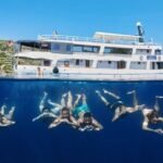 Sail Croatia Navigator passengers swimming under ship