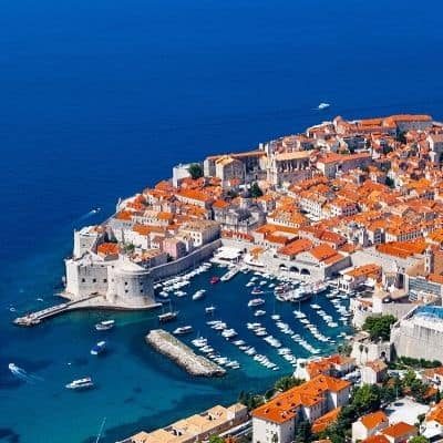 An aerial view of the city of Dubrovnik in Croatia with its large stone walls
