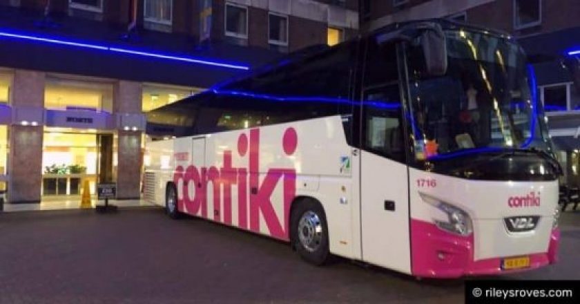 Contiki bus waiting to depart from Royal National Hotel in London